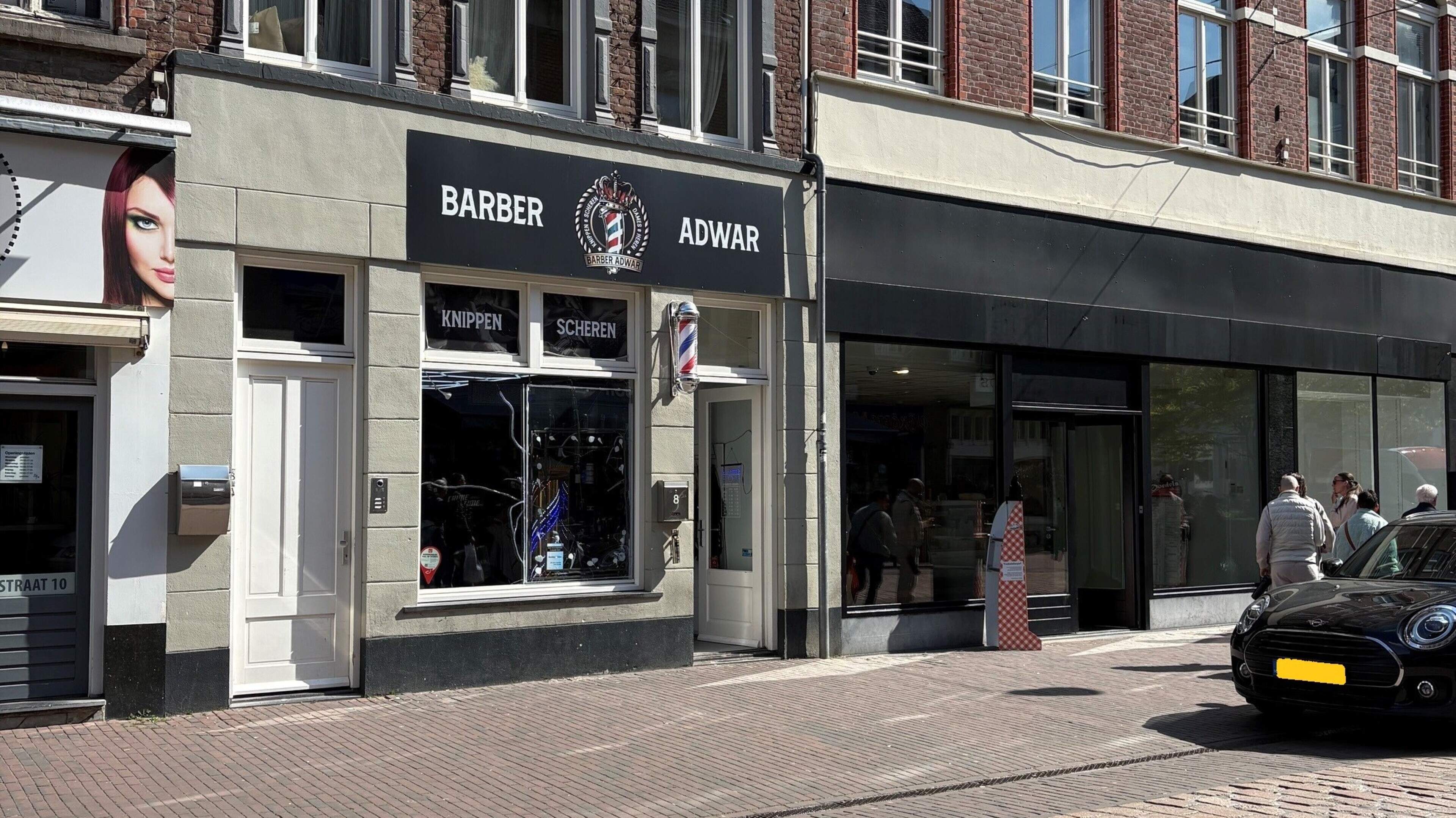 Is steen door ruit teken dat kappersoorlog in Roermond weer oplaait? Adwar bezweert van niet: ‘Losst